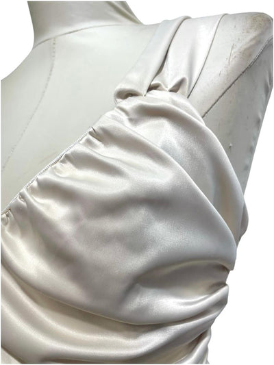 Vestido beige Elegancia Asimétrica